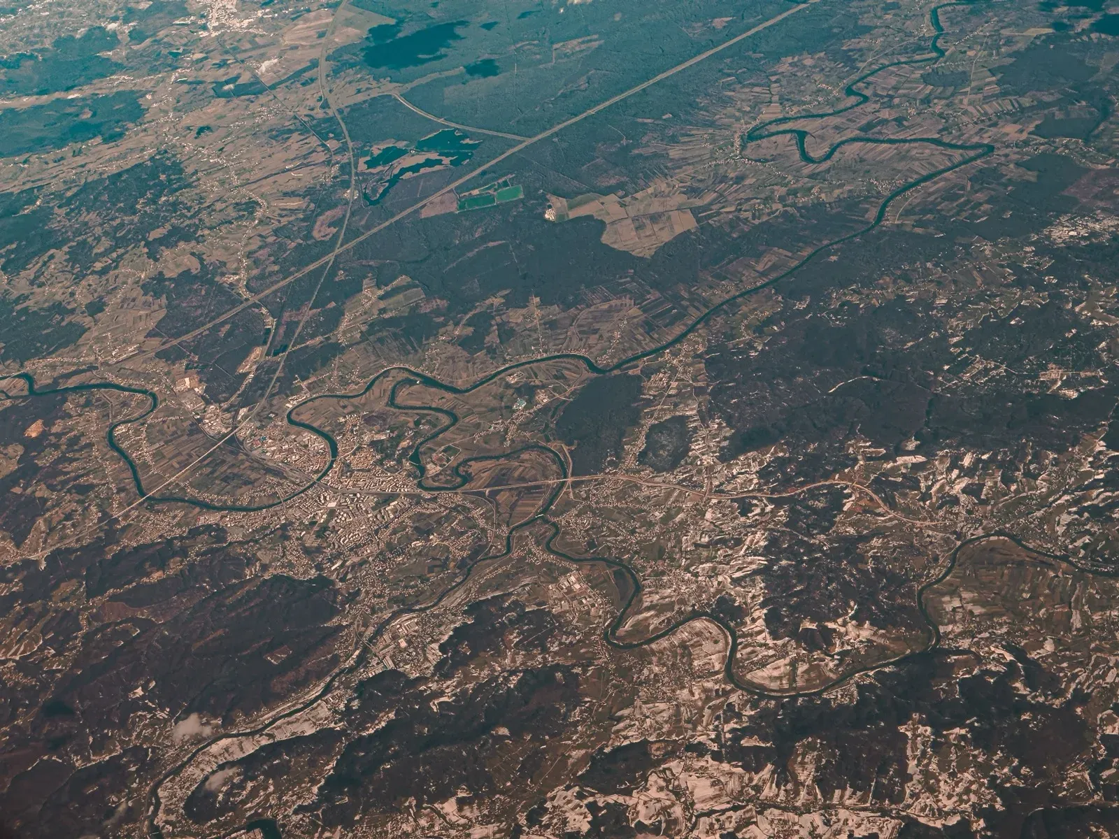 A river meandering across a valley, seen from high altitude