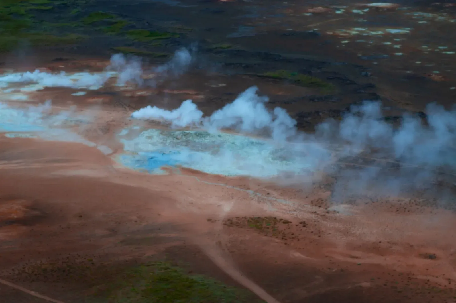 Terraced hot springs and steam vents seen from above
